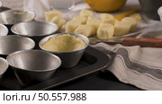 Egg tarts, traditional portuguese dessert, pastel de nata, custard tarts home production ingredients. Стоковое фото, агентство Ingram Publishing / Фотобанк Лори