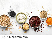 Various types of legumes, beans, lentils. chickpeas and peas, top view. Стоковое фото, агентство Ingram Publishing / Фотобанк Лори