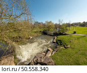 Waterfall on the Caster River in the City Park of Ovar. Стоковое фото, агентство Ingram Publishing / Фотобанк Лори