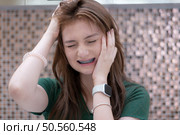 Young woman with toothache, dental problem. Health care concept. Стоковое фото, агентство Ingram Publishing / Фотобанк Лори