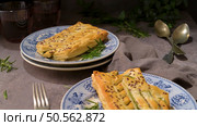Savory pastry garnished with herbs, a feast for the eyes and palate. Стоковое фото, агентство Ingram Publishing / Фотобанк Лори