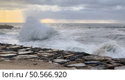 OVAR, PORTUGAL - 31 OCTOBER 2023: The sea rises to the seafront of Furadouro in Ovar. The advance of the sea due to climate change threatens Portugal. Стоковое фото, агентство Ingram Publishing / Фотобанк Лори