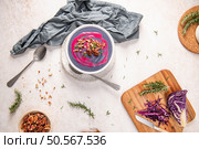 Purple Sweet Potato Soup with a swirl of Beetroot and Pecan Crumble. Стоковое фото, агентство Ingram Publishing / Фотобанк Лори