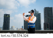 Engineers use VR machines to inspect completed air conditioning and water systems before testing for further work. Стоковое фото, агентство Ingram Publishing / Фотобанк Лори