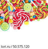 Colorful candies and lollipops isolated on a white background. Стоковое фото, агентство Ingram Publishing / Фотобанк Лори