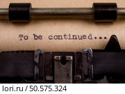 To be continued - typed words on a Vintage Typewriter. Стоковое фото, агентство Ingram Publishing / Фотобанк Лори