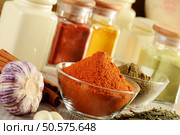 Composition with variety of spices on kitchen table. Стоковое фото, агентство Ingram Publishing / Фотобанк Лори