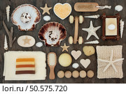 Bathroom and spa products with exfoliating scrubs, bath bombs, crystals and  soaps, toweilling and sponge accessories with shells. Стоковое фото, агентство Ingram Publishing / Фотобанк Лори