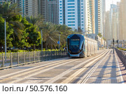 New modern tram in Dubai, United Arab Emirates. Стоковое фото, агентство Ingram Publishing / Фотобанк Лори