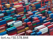 Lot’s of cargo freight containers in the Hong Kong sea port. Стоковое фото, агентство Ingram Publishing / Фотобанк Лори