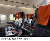 Салон самолета компании Аэрофлот. Места для пассажиров. Boeing 737-800. Хвостовая часть. Редакционное фото, фотограф Мария Симакова / Фотобанк Лори