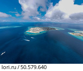 Maldives paradise scenery. Tropical aerial landscape, seascape with long jetty, water villas with amazing sea and lagoon beach, tropical nature. Exotic tourism destination banner, summer vacation. Стоковое фото, агентство Ingram Publishing / Фотобанк Лори