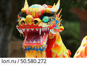 Dancing Dragon at Chinese New Year Parade. Стоковое фото, агентство Ingram Publishing / Фотобанк Лори