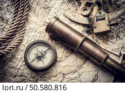 vintage still life with compass,sextant spyglass and old map. Стоковое фото, агентство Ingram Publishing / Фотобанк Лори