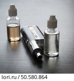 Advanced personal vaporizer or e-cigarette, close up. Стоковое фото, агентство Ingram Publishing / Фотобанк Лори