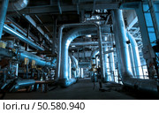 Pipes, tubes, valves, cables at a power plant . Стоковое фото, агентство Ingram Publishing / Фотобанк Лори