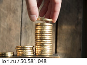 financial growth concept with stacks of golden coins. Стоковое фото, агентство Ingram Publishing / Фотобанк Лори