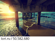 Pier on the sea at sunset. Стоковое фото, агентство Ingram Publishing / Фотобанк Лори