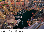 Majestic colorful dubai marina skyline during night. Multiple tallest skyscrapers of the world. Dubai marina, United Arab Emirates. Стоковое фото, агентство Ingram Publishing / Фотобанк Лори