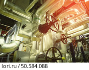 Equipment, cables and piping as found inside of a old industrial power plant. Стоковое фото, агентство Ingram Publishing / Фотобанк Лори