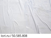 white crumpled and creased glued wrinkled paper poster texture background. Стоковое фото, агентство Ingram Publishing / Фотобанк Лори