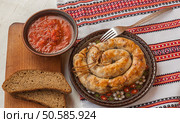 Roasted homemade sausages and rye bread. Стоковое фото, агентство Ingram Publishing / Фотобанк Лори