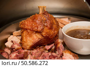 Traditional German Dishes, deep fried knuckle of pork with bones. Стоковое фото, агентство Ingram Publishing / Фотобанк Лори