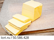 butter in parchment paper. Стоковое фото, агентство Ingram Publishing / Фотобанк Лори