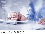 Hands of businessman working with keyboard and mouse. Working on pc. Стоковое фото, агентство Ingram Publishing / Фотобанк Лори