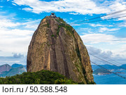 Christ, symbol of Rio de Janeiro, standing on top of Corcovado Hill, overlooking Guanabara Bay and Sugarloaf, Rio de Janeiro, Brazil. Стоковое фото, агентство Ingram Publishing / Фотобанк Лори