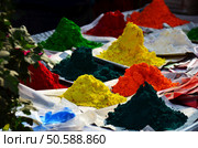 Powder paint color for Nepalese people select buy decorated rite ritual house home in Halloween festive and diwali festival celebration of lights in street market bazaar at thamel in Kathmandu, Nepal. Стоковое фото, агентство Ingram Publishing / Фотобанк Лори