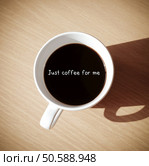 Any time is coffee time : Quote with coffee cup on wood background, top view. Стоковое фото, агентство Ingram Publishing / Фотобанк Лори