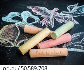 School concept on a blackboard chalk drawn bells and notebook. Стоковое фото, агентство Ingram Publishing / Фотобанк Лори