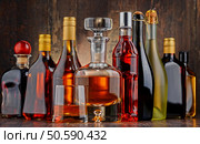 Composition with bottles of assorted alcoholic beverages. Стоковое фото, агентство Ingram Publishing / Фотобанк Лори