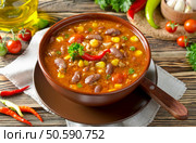Mexican dish Chili Con Carne in plate. Стоковое фото, агентство Ingram Publishing / Фотобанк Лори