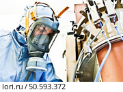 Calm In The Face of Danger - Female Hazmat / Hachem Scientist @ Work. Стоковое фото, агентство Ingram Publishing / Фотобанк Лори