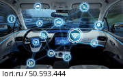 intelligent vehicle cockpit and wireless communication network concept. Стоковое фото, агентство Ingram Publishing / Фотобанк Лори