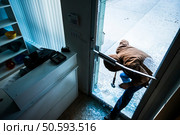 Robber using a sledgehammer, Стоковое фото, агентство Ingram Publishing / Фотобанк Лори