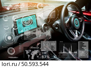 Smart car (HUD) concept. Empty cockpit in vehicle and Self-Driving mode car graphic screen with flare light. Стоковое фото, агентство Ingram Publishing / Фотобанк Лори