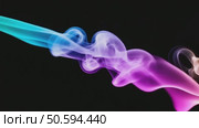 Colorful smoke trails unfolding on black background. Стоковое AI-видео, аниматор Юрий Поздников / Фотобанк Лори