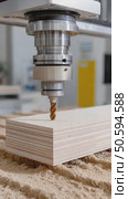 Automated drilling machine creating holes in plywood block. Стоковое AI-видео, аниматор Юрий Поздников / Фотобанк Лори