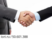 Businessmen shaking hands after reaching agreement. Стоковое AI-изображение, AI-художник Иван Рябоконь / Фотобанк Лори