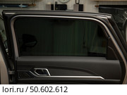 Tinting of car windows.Window film for car. Стоковое фото, фотограф Александр Поташев / Фотобанк Лори