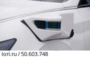 Self-driving vehicle with mounted lidar sensor, close-up shot. Редакционное фото, фотограф Семён Прудий / Фотобанк Лори