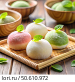 Fresh Mo chi Dessert With Green Tea and Mint on Wooden Tray. Generative AI. Стоковое AI-изображение, AI-художник Roman Zavorotny / Фотобанк Лори
