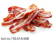 Delicious crispy bacon rashers forming a tasty pile on white background. Стоковое AI-изображение, AI-художник Иван Рябоконь / Фотобанк Лори