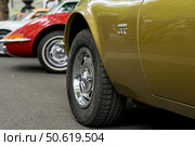 BERLIN - MAY 10, 2025: Row of classic Opel GT cars (1968-1973) at Berlin Classic Days. German sports coupes in formation. Focus on the foreground. Редакционное фото, фотограф Sergey Kohl / Фотобанк Лори