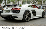 BERLIN - MAY 10, 2025: Audi R8, rear view of modern supercar on display at the Classic Days Berlin, showcasing sleek design and dynamic profile. Редакционное фото, фотограф Sergey Kohl / Фотобанк Лори