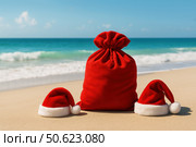 Sand snowman and Santa bag by ocean. Стоковое AI-изображение, AI-художник Екатерина Усенко / Фотобанк Лори