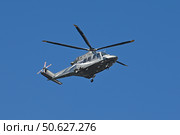 Вертолет AgustaWestland AW139 (RA-01697) ООО «Авиакомпания “Северо-Запад”» на фоне голубого неба в Сочи (2021 год). Редакционное фото, фотограф Екатерина Лызлова / Фотобанк Лори